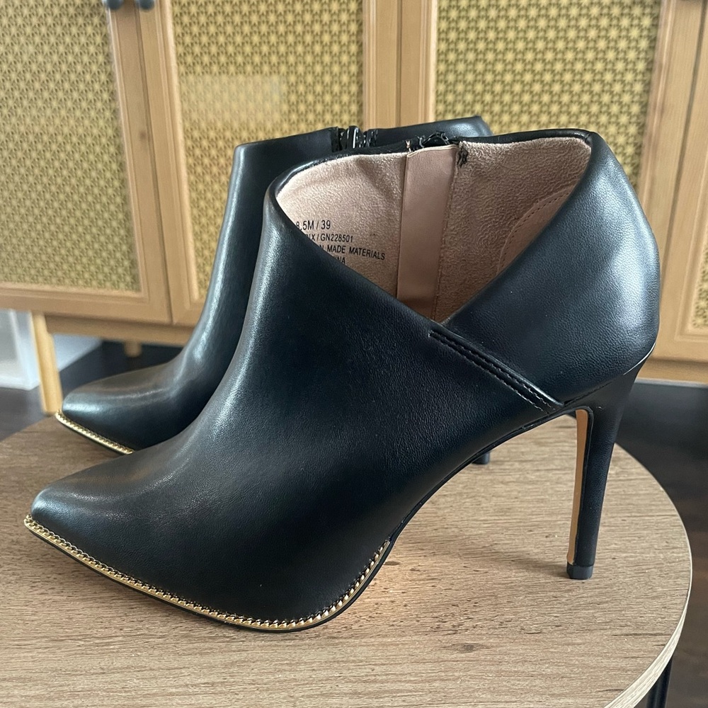 Never worn black booties